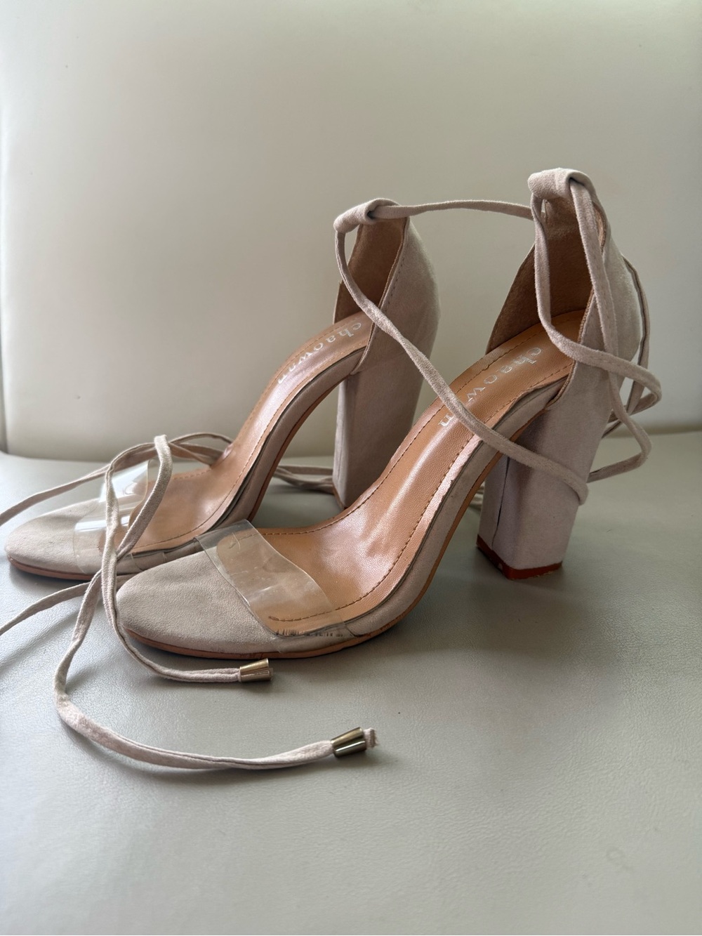 Nude and clear suede heels with ankle ties